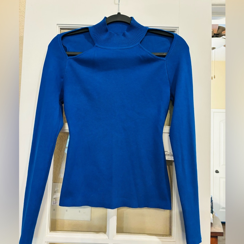 Women’s sweater with beautiful cut out , size Small